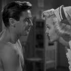Richard Basehart and Marilyn Maxwell in Outside the Wall (1950)