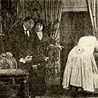 Renée Carl, René Dary, Jeanne Saint-Bonnet, and Paul Manson in Bébé tire à la cible (1912)