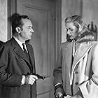 Lauren Bacall and Charles Boyer in Confidential Agent (1945)