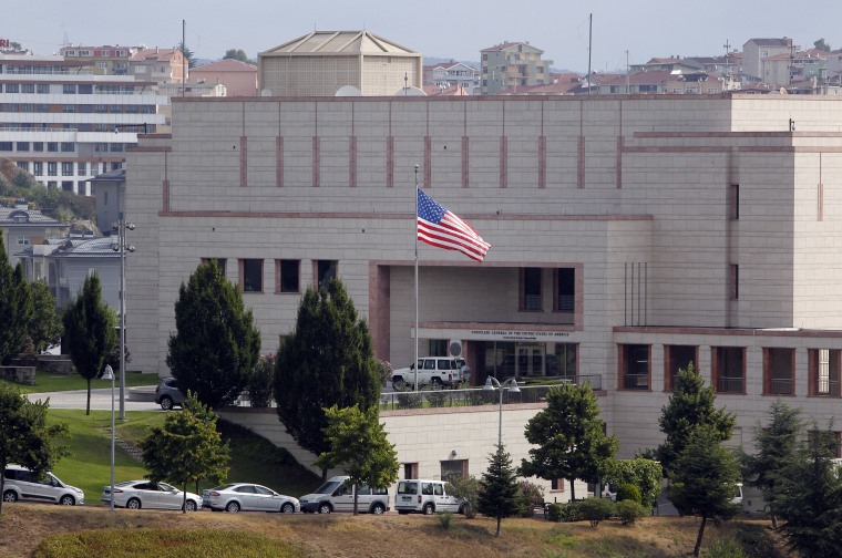 A U.S. flag flies in front of the U.S. Consulate building in Istanbul, Monday, Aug. 10, 2015.