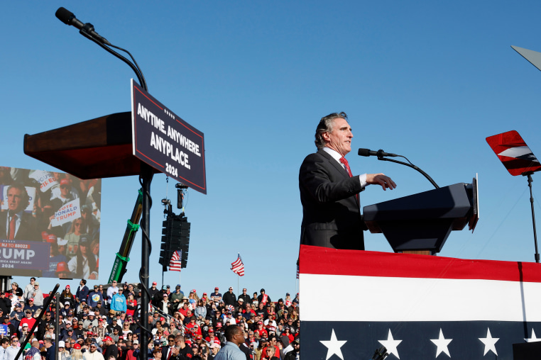 North Dakota Gov. Doug Burgum speaks during a campaign rally for Donald Trump 