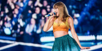 Taylor Swift performs on stage