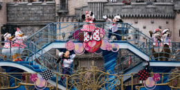 Actors dressed as Walt Disney characters Minnie Mouse and Mickey Mouse perform during a press preview for the "Minnie Besties Bash!" parade at Tokyo DisneySea