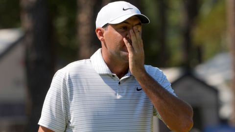 Scottie Scheffler reacts after missing a putt on the second hole during the second round of the U.S. Open golf tournament Friday, June 14, 2024, in Pinehurst, N.C. (AP Photo/Matt York)
