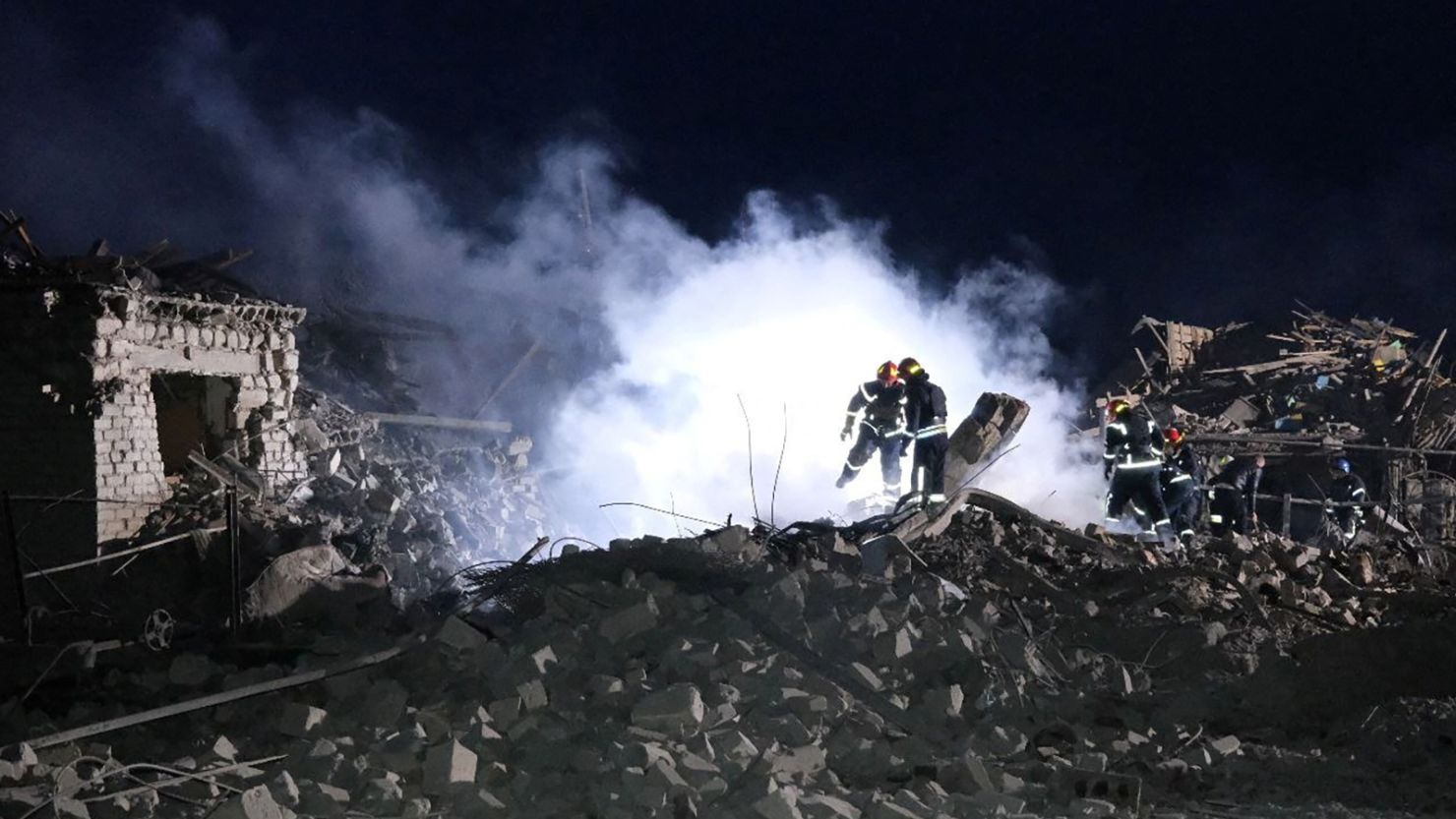 Rescuers work at the site of a Russian missile strike in an area of the Pokrovsk town, amid Russia's attack on Ukraine, in Donetsk region, Ukraine January 6, 2024.