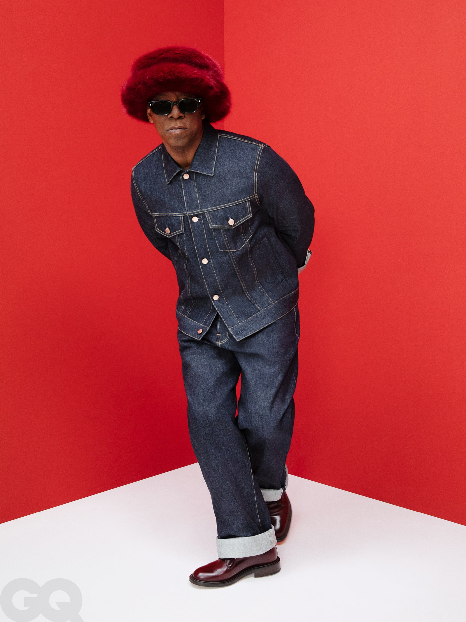 Image may contain Ian Wright Clothing Pants Accessories Glasses Adult Person Hat Footwear Shoe and Jeans