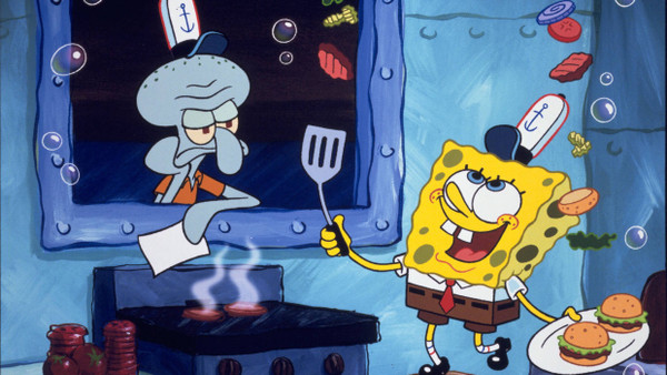 Spongebob bereitet Krabbenburger zu.