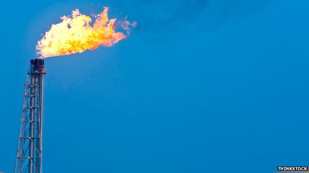 Gas flare against a blue sky