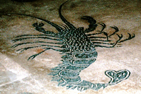 
[image ALT: A detail of a Roman mosaic floor, showing a lobster.]
		