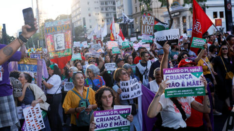 People protest against a bill that would equate abortion after 22 weeks of pregnancy with homicide, in Sao Paulo, Brazil on June 15, 2024.