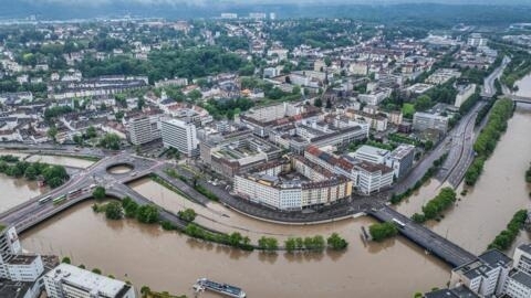An aerial view taken on May 18, 2024 in Saarbruecken, western Germany shows the city motorway A620 partially inundated after heavy rains caused flooding.