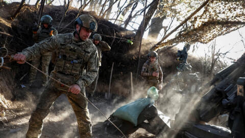 Ukrainian troops fire a M777 howitzer towards Russian positions in Donetsk region on April 20, 2024.