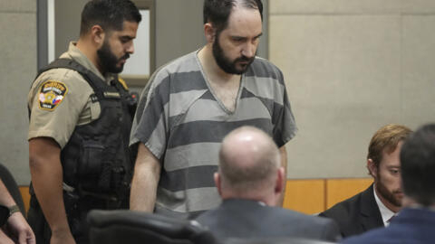 Daniel Perry enters the courtroom at the Blackwell-Thurman Criminal Justice Center, May 10, 2023, in Austin, Texas.