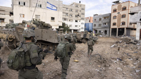سربازان اسرائیلی در محله شجاعیه شهر غزه / 8 دسامبر 2023