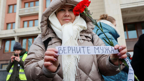 Жена мобилизованного на акции движения «Путь домой» в центре Москвы, 3 февраля 2023 г.