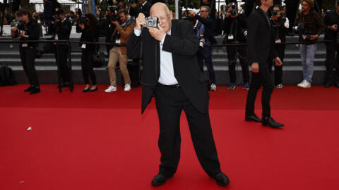 French photographer and director Raymond Depardon arrives for the screening of the film "Les Annees declic" (The Declic Years) at the Cannes Film Festival, southern France, on 15 May, 2024.