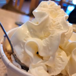 Evan's Restaurant - Rice pudding with whipped cream