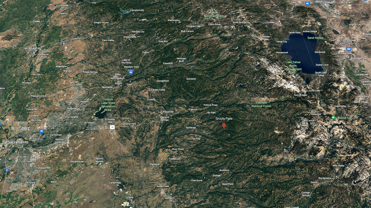 A gif shows satellite imagery translated into Dynamic World imagery with lots of green area indicating tree coverage before the fire and most of that area turning yellow indicating shrub/scrub after the fire.