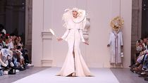 Anna Cleveland wears a creation for the Thom Browne Haute Couture Fall-Winter 2024-2025 collection.