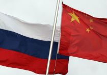 Россия и КНР строят альтернативный, справедливый мир, ослабляющий Запад, заявил бывший директор банка ABN Amro по стратегиям внешней торговли, кандидат экономических наук Тони Норфилд